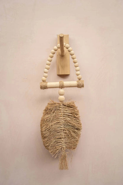 La décoration suspendue triangle en raphia